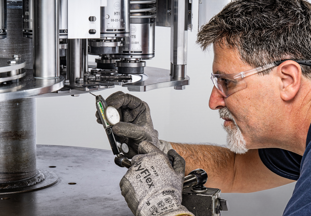 CSI technician providing capping equipment support on beverage production line